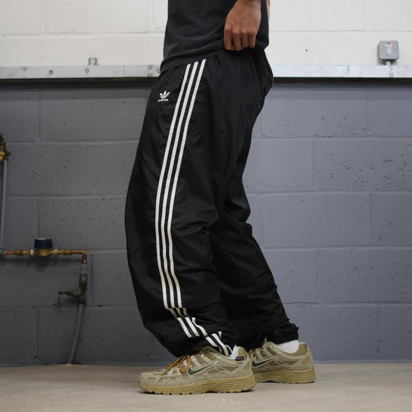 Vintage Adidas tracksuit bottoms loose black Loose floaty embroidered side stripe track pants