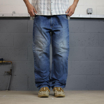 Vintage Carhartt relaxed denim jeans y2k blue Straight leg skater style 2000s style workwear jeans