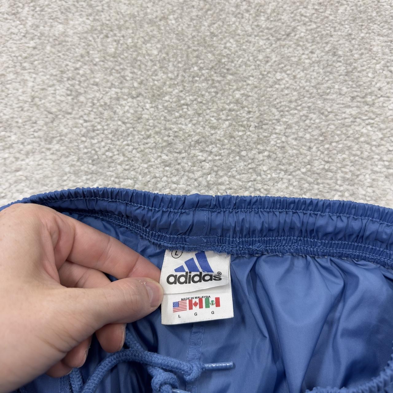 Vintage y2k Adidas tracksuit bottoms blue Loose leg embroidered side stripe 2000s style track pants