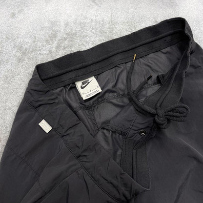 Vintage y2k Nike tracksuit bottoms black Lightweight swoosh logo running track pants