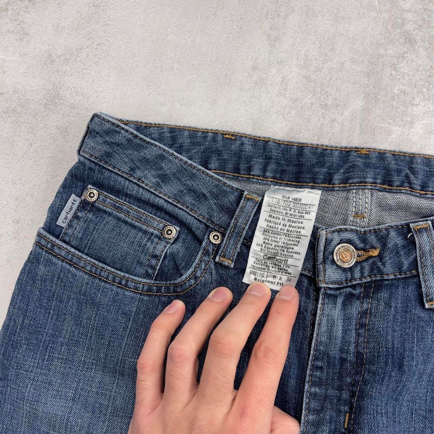 Blue Carhartt jeans size 8 W30L34 original fit bootcut denim jeans patch logo