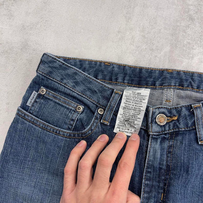 Blue Carhartt jeans size 8 W30L34 original fit bootcut denim jeans patch logo