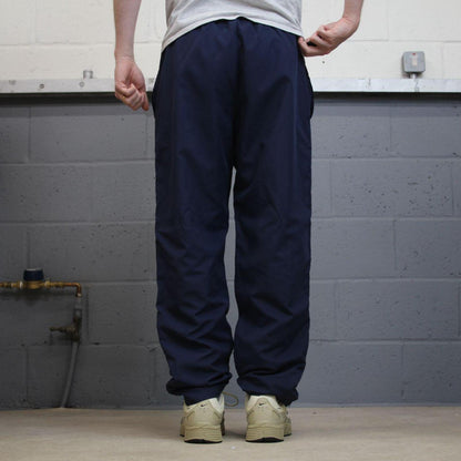 Vintage Reebok tracksuit bottoms loose navy Floaty embroidered mesh lined track pants