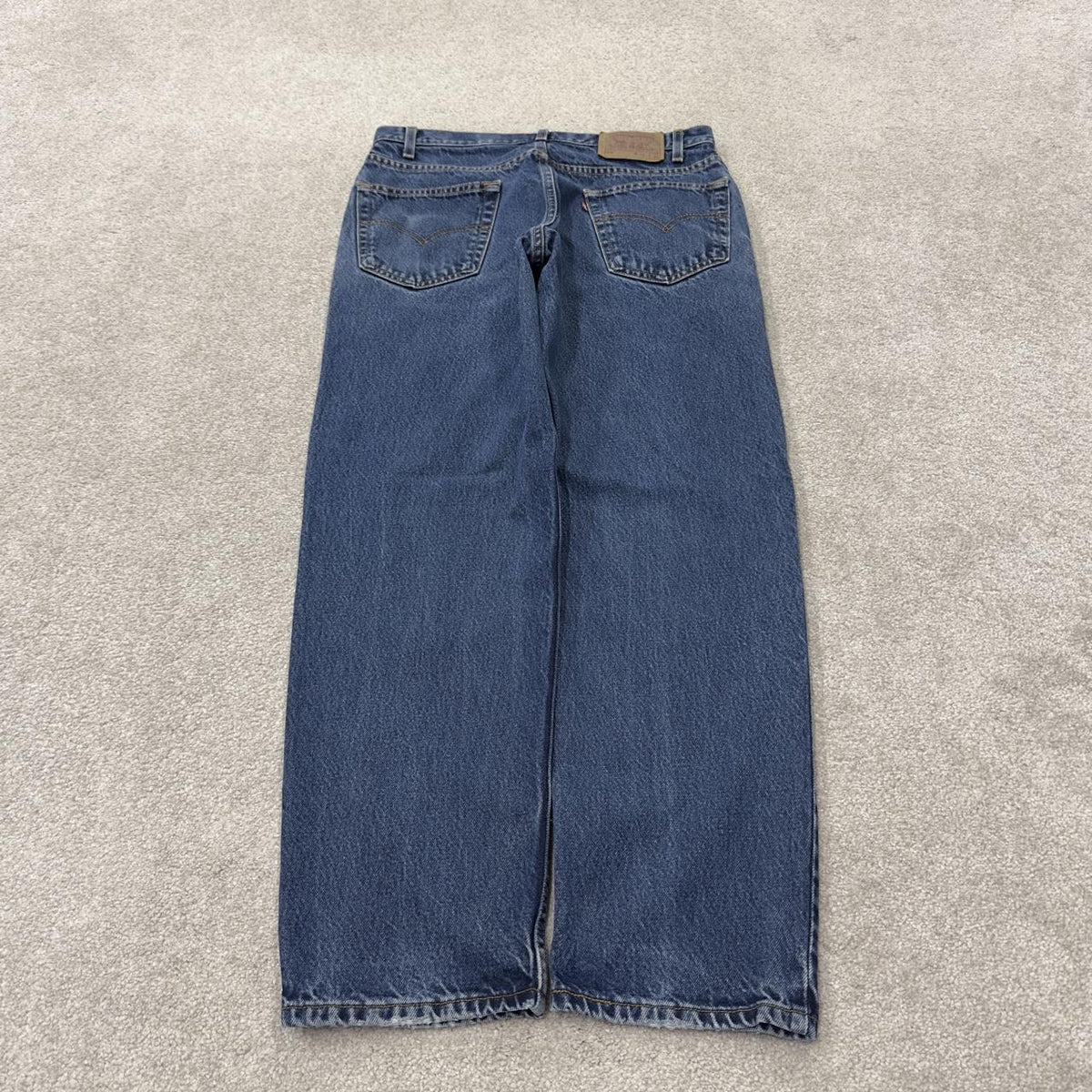 Levi’s 550 jeans Y2K blue denim Levi’s loose straight leg 2000s style pants red tab logo