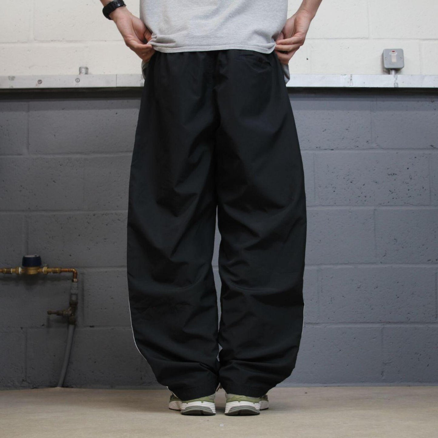 Baggy Nike tracksuit bottoms black Wide leg mesh lined embroidered side stripe track pants