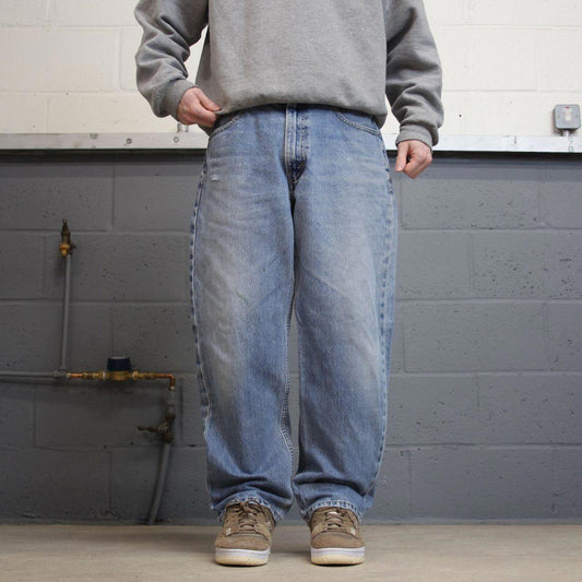 Y2K baggy Levi’s 550 jeans wide leg blue Loose fit denim pants red tab logo
