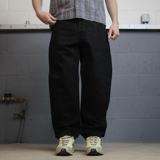 Levi’s 550 relaxed jeans y2k W34L30 black loose straight leg pants red tab logo
