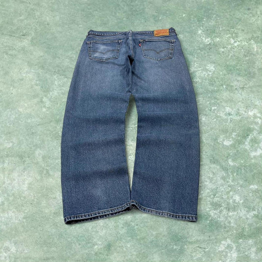 Vintage y2k Levi's 505 jeans blue Straight leg denim casual pants red tab logo