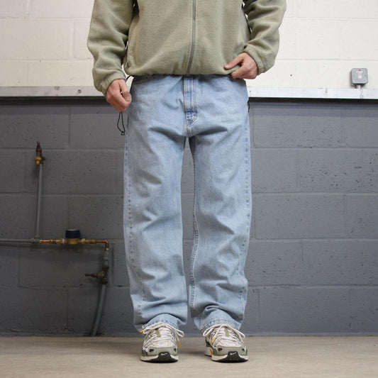 Vintage Y2K Levi’s 505 jeans light wash blue Straight leg 00s style denim pants red tab logo