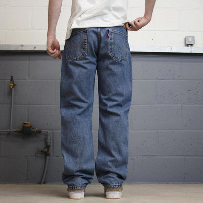Blue Levis 505 jeans W34L32 blue straight leg y2k style pants red tab logo