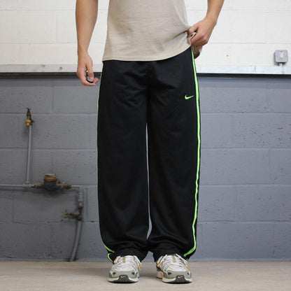 Baggy Nike Trackies Large Black y2k 00s style loose wide leg joggers embroidered logo side stripe