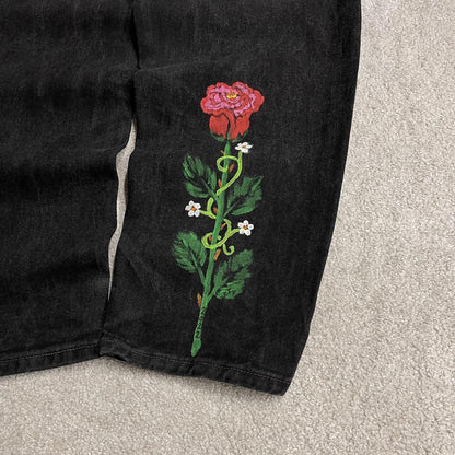 Vintage Levi's 560 jeans y2k black Loose fit denim pants red tab logo