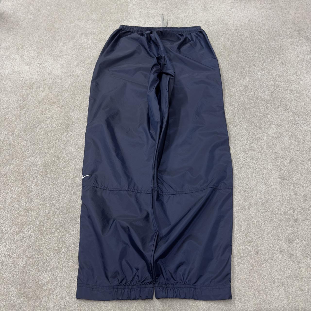 Vintage Nike tracksuit bottoms Y2K navy Loose leg unlined embroidered swoosh track pants