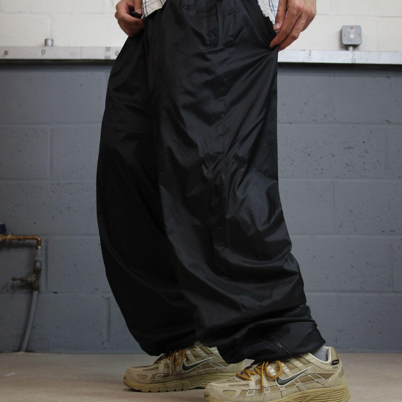Champion baggy tracksuit bottoms black embroidered Loose mesh lined casual track pants