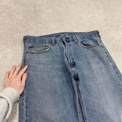 Vintage Y2K Levi’s 505 jeans blue Straight leg 00s style denim pants red tab logo