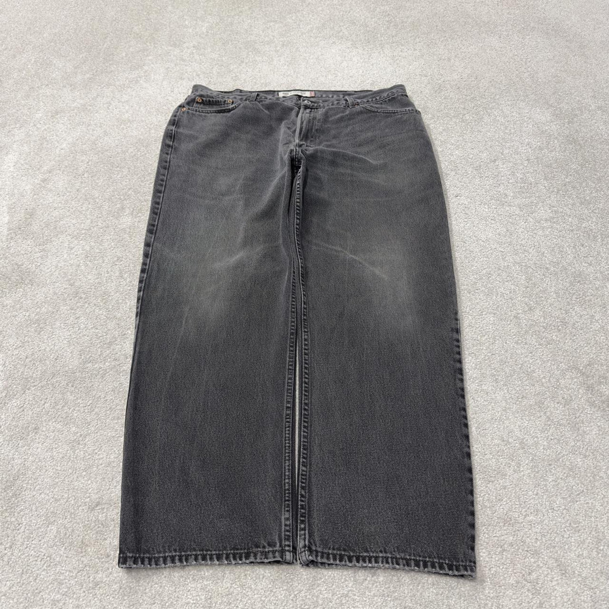 Levi’s 550 jeans Y2K relaxed fit denim faded black Levi’s loose leg 2000s style pants red tab logo