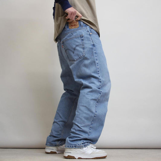 Levis jeans W38 L32 loose blue denim 90s style jeans red tab logo
