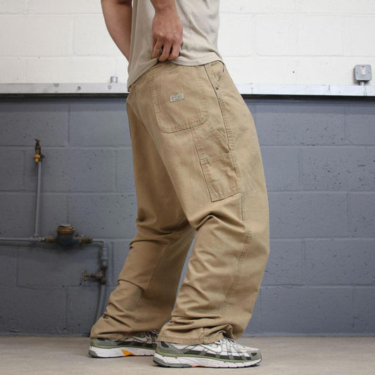 Tan Wrangler carpenter pants W42L32 loose cargo skater style trousers