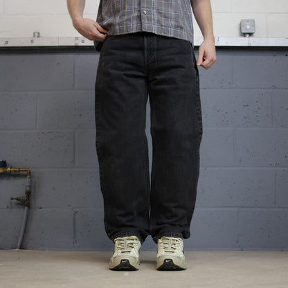 Levi’s 550 jeans y2k black denim Levi’s loose straight leg relaxed fit red tab logo pants