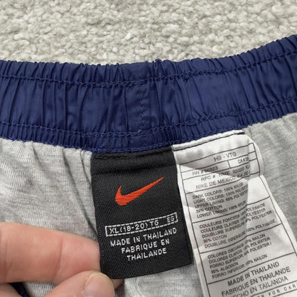 Y2K vintage Nike baggy tracksuit bottoms navy Loose leg 2000s style casual swoosh logo track pants