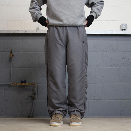 Vintage Y2K Reebok tracksuit bottoms grey Embroidered logo soft lined gym track pants