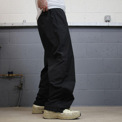 Champion baggy tracksuit bottoms wide leg black Mesh lined embroidered logo gym wear track pants