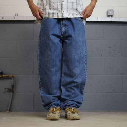 Levi’s 550 jeans Y2K blue denim loose leg 2000s style pants red tab logo