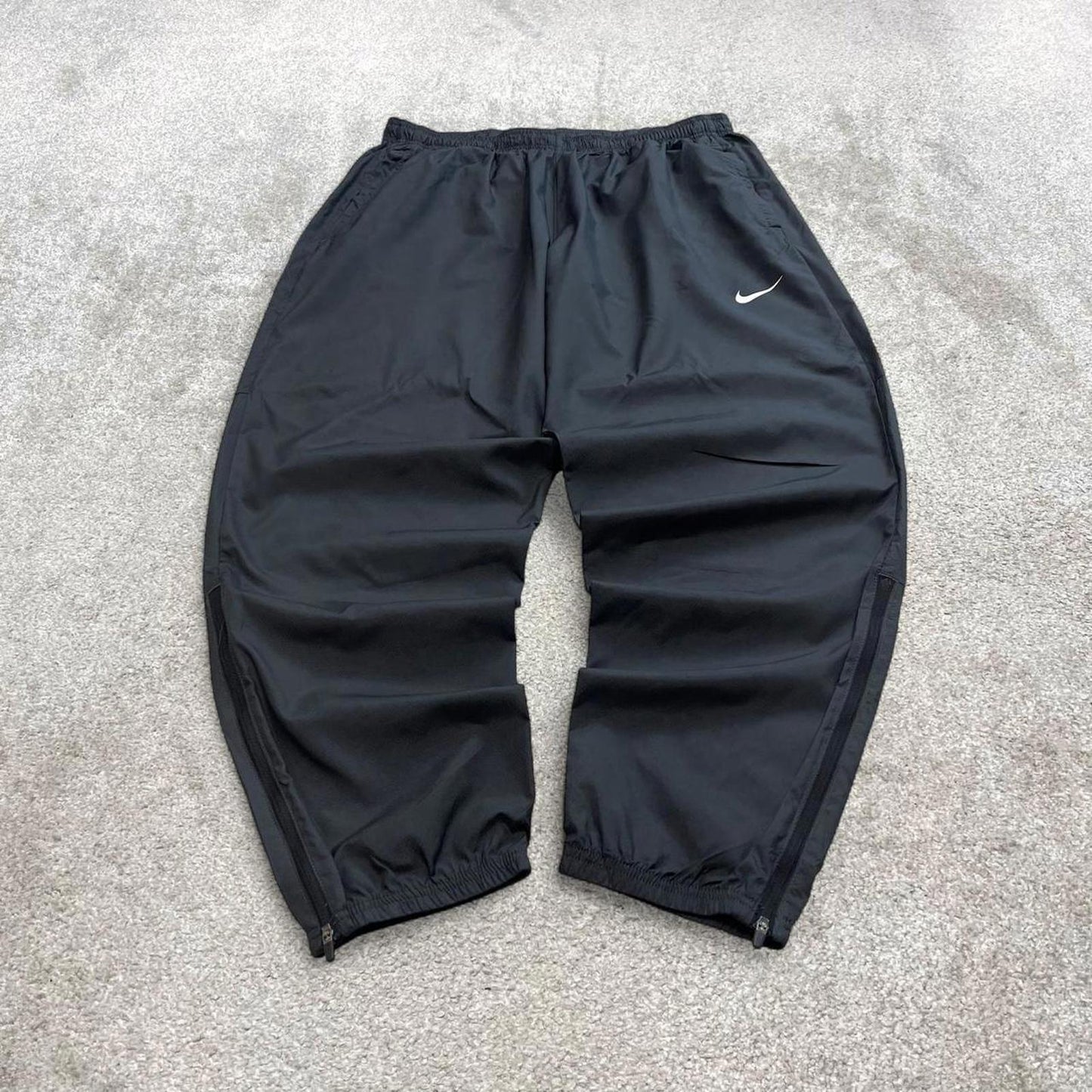 Grey Nike trackies XL loose y2k style joggers print Swoosh logo gym wear track pants