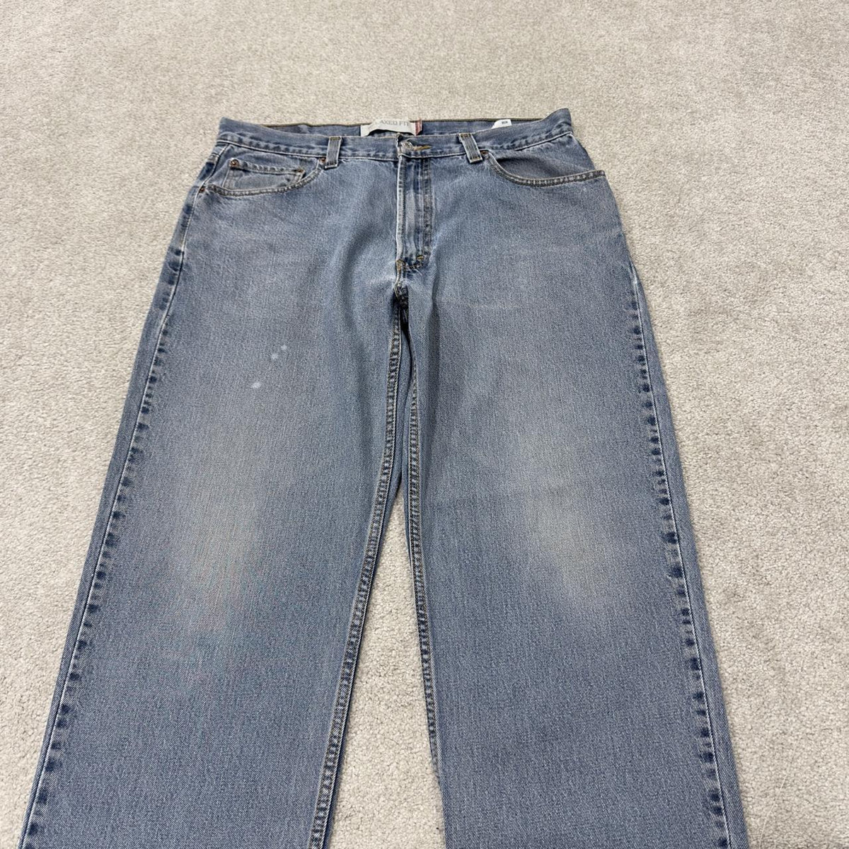 Levi’s 550 jeans Y2K blue relaxed denim Levi’s loose leg 2000s style pants red tab logo