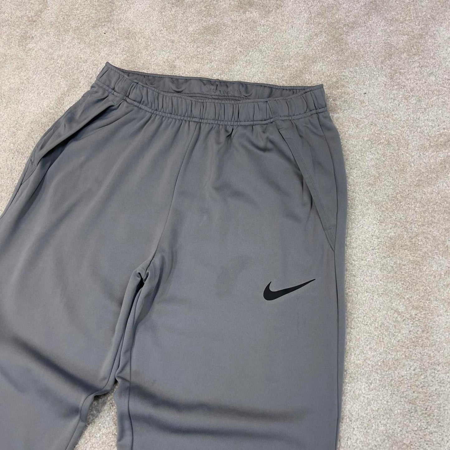 Nike Trackies Large Grey y2k 00s style loose leg Dri-Fit joggers print Swoosh logo