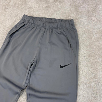 Nike Trackies Large Grey y2k 00s style loose leg Dri-Fit joggers print Swoosh logo