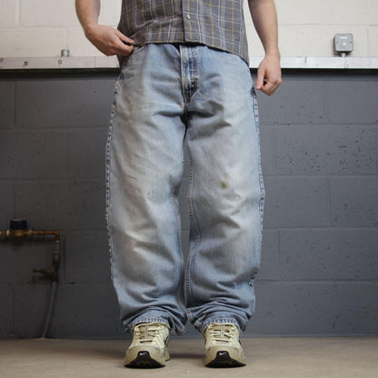 Levi’s 550 baggy jeans y2k W36L36 blue relaxed fit surf style pants red tab logo
