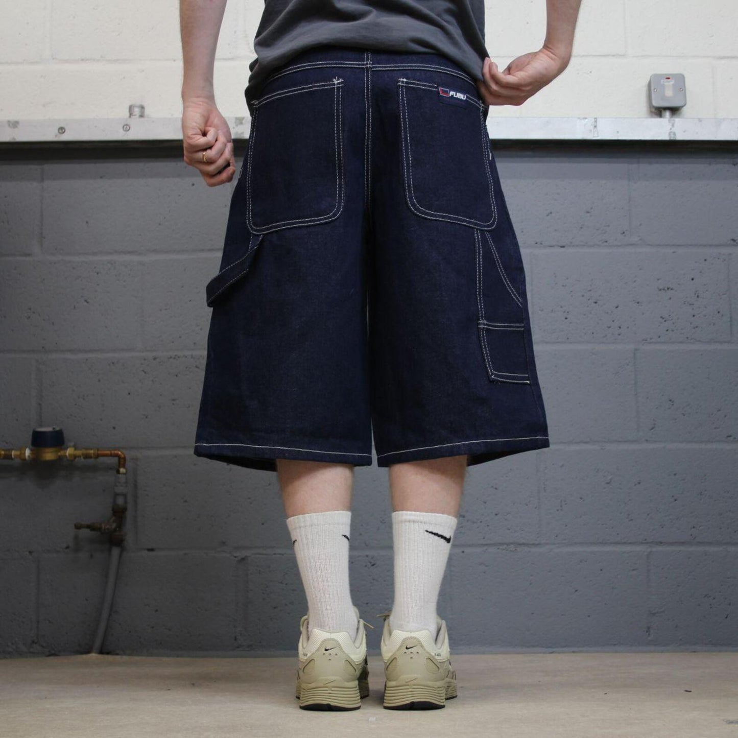 Baggy denim carpenter shorts y2k navy blue Thick denim cargo festival shorts with FUBU details