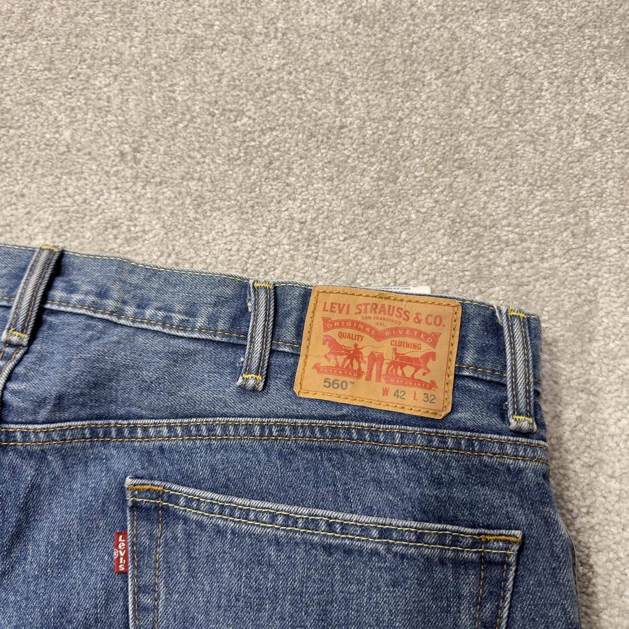 Baggy Levi’s 560 jeans y2k blue denim Levi’s wide leg skater 2000s style red tab logo pants