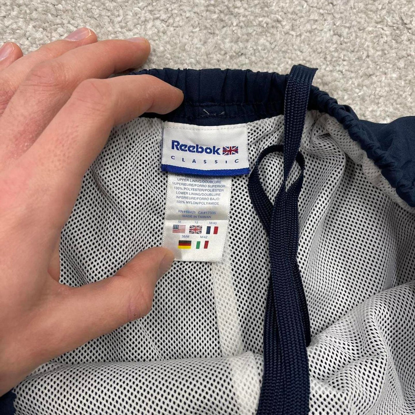 Vintage y2k Reebok tracksuit bottoms navy Loose lined embroidered track pants ankle zips