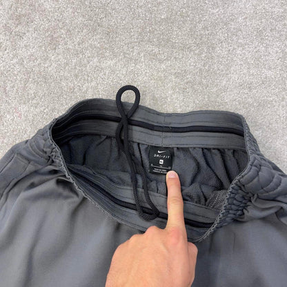 Nike Trackies XL Grey y2k 00s style loose leg joggers print logo fleece lined