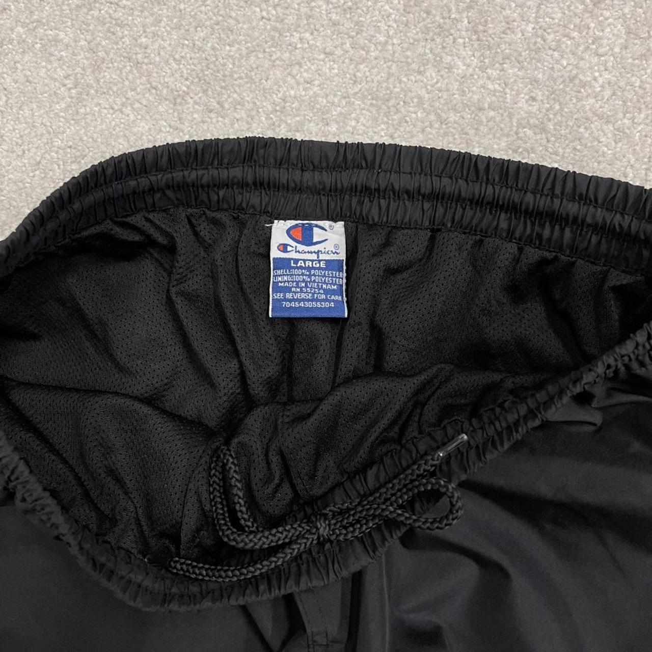 Champion baggy tracksuit bottoms wide leg black Mesh lined embroidered logo gym wear track pants