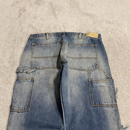 Y2K mnml bootcut jeans W32L36 patch work blue denim Slightly flared carpenter jeans reworked style