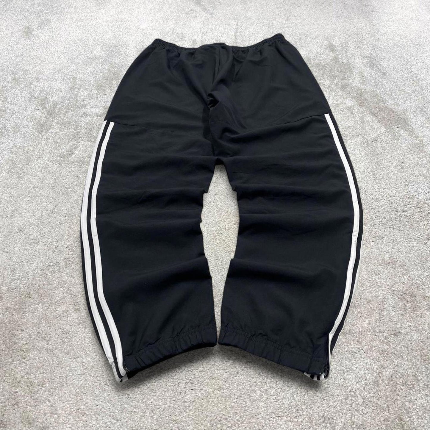 Black Adidas trackies Large y2k loose style sportswear track pants embroidered side stripe design