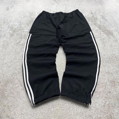 Black Adidas trackies Large y2k loose style sportswear track pants embroidered side stripe design