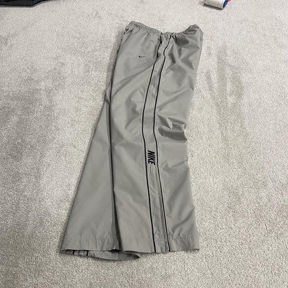 Vintage Nike baggy tracksuit bottoms Y2K grey Wide leg lined embroidered side stripe track pants