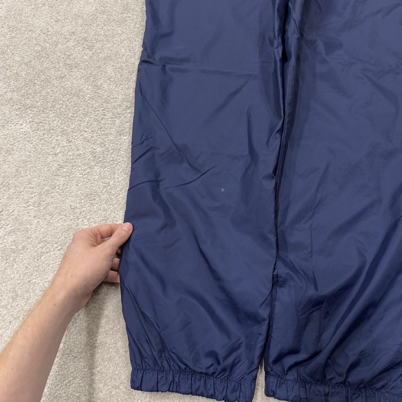 Y2K vintage Nike baggy tracksuit bottoms navy Loose leg 2000s style casual swoosh logo track pants