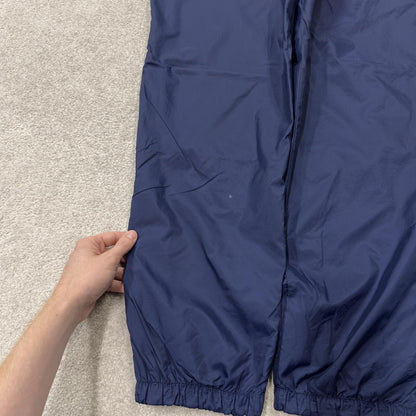 Y2K vintage Nike baggy tracksuit bottoms navy Loose leg 2000s style casual swoosh logo track pants