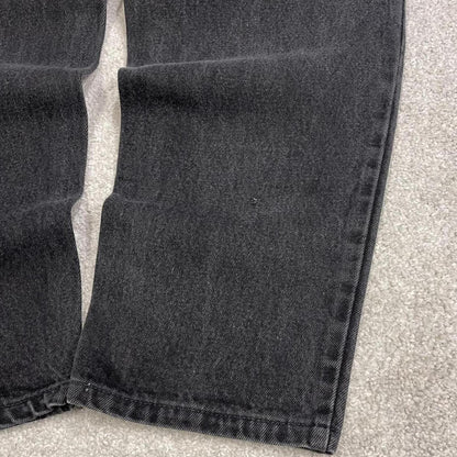 Vintage Levi's 560 jeans loose fit tapered leg black USA made 100% cotton denim pants red tab logo