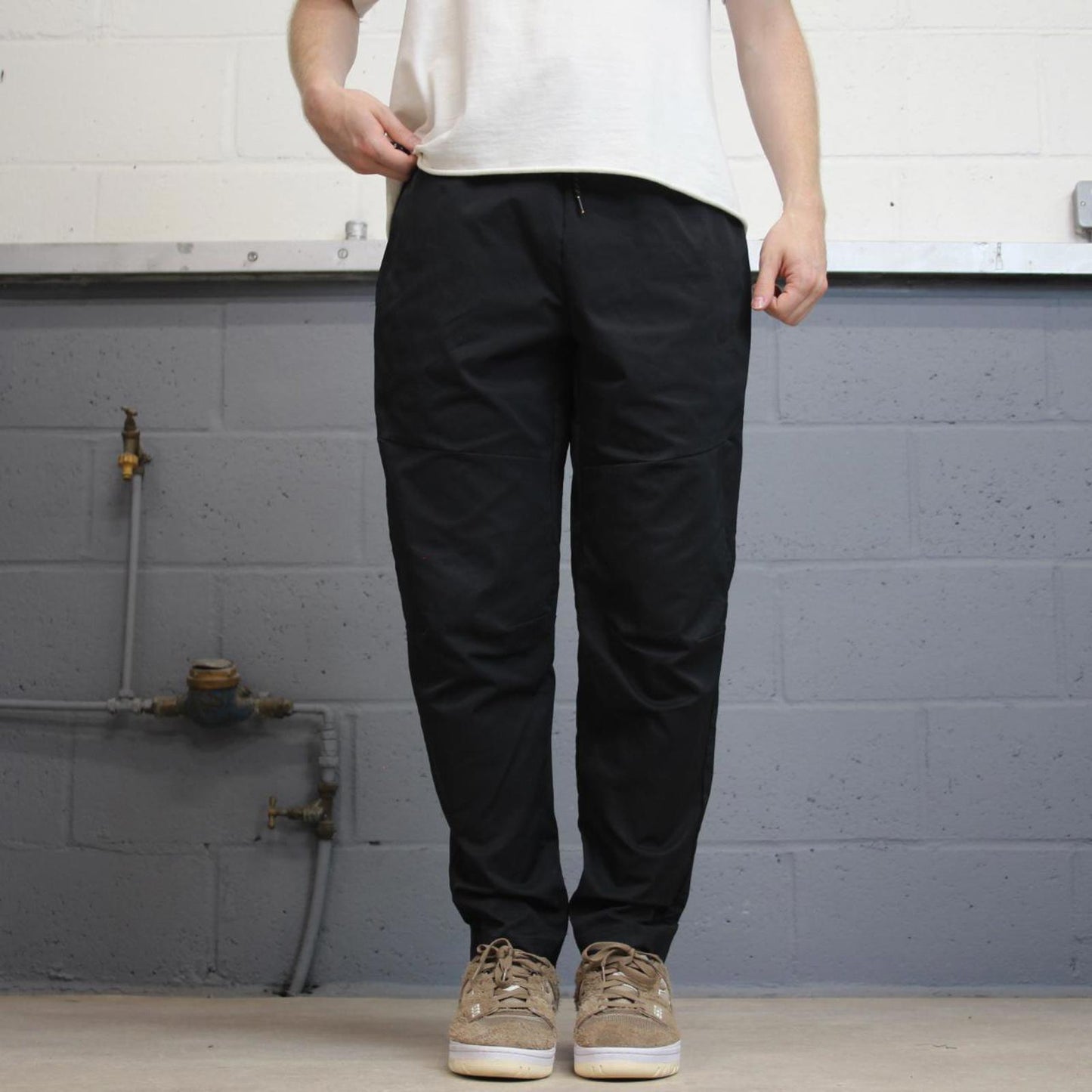 Black Nike Trackies M loose track pants print logo