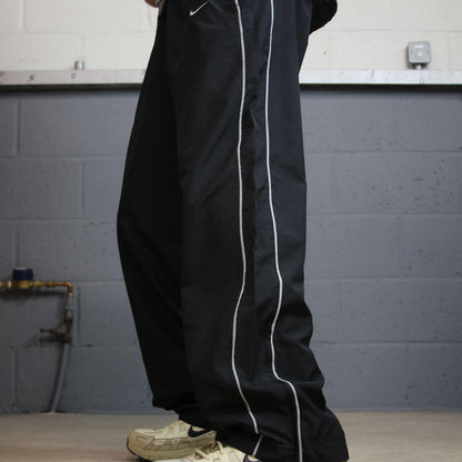 Vintage Nike baggy tracksuit bottoms black wide leg L swoosh logo track pants