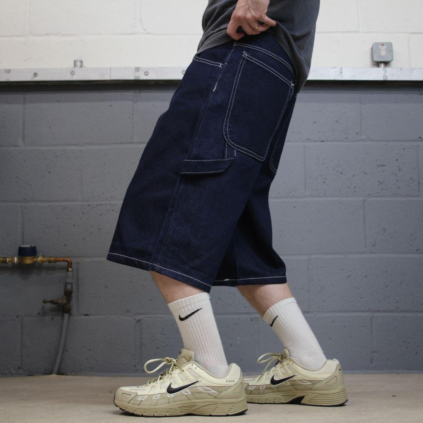 Baggy denim carpenter shorts y2k navy blue Thick denim cargo festival shorts with FUBU details