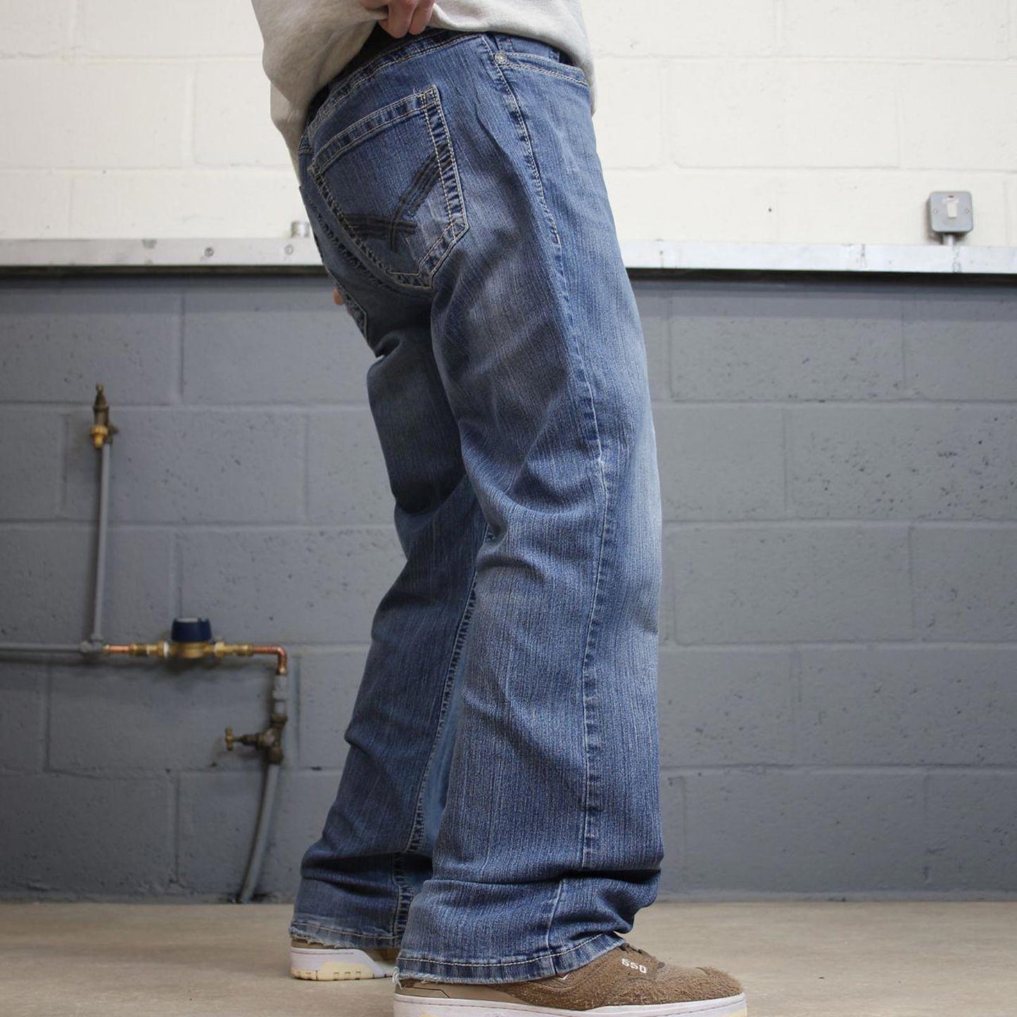 Y2k embroidered Axel bootcut jeans W38L32 blue denim stitched 00s skate style pants