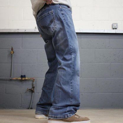 Y2k embroidered Axel bootcut jeans W38L32 blue denim stitched 00s skate style pants