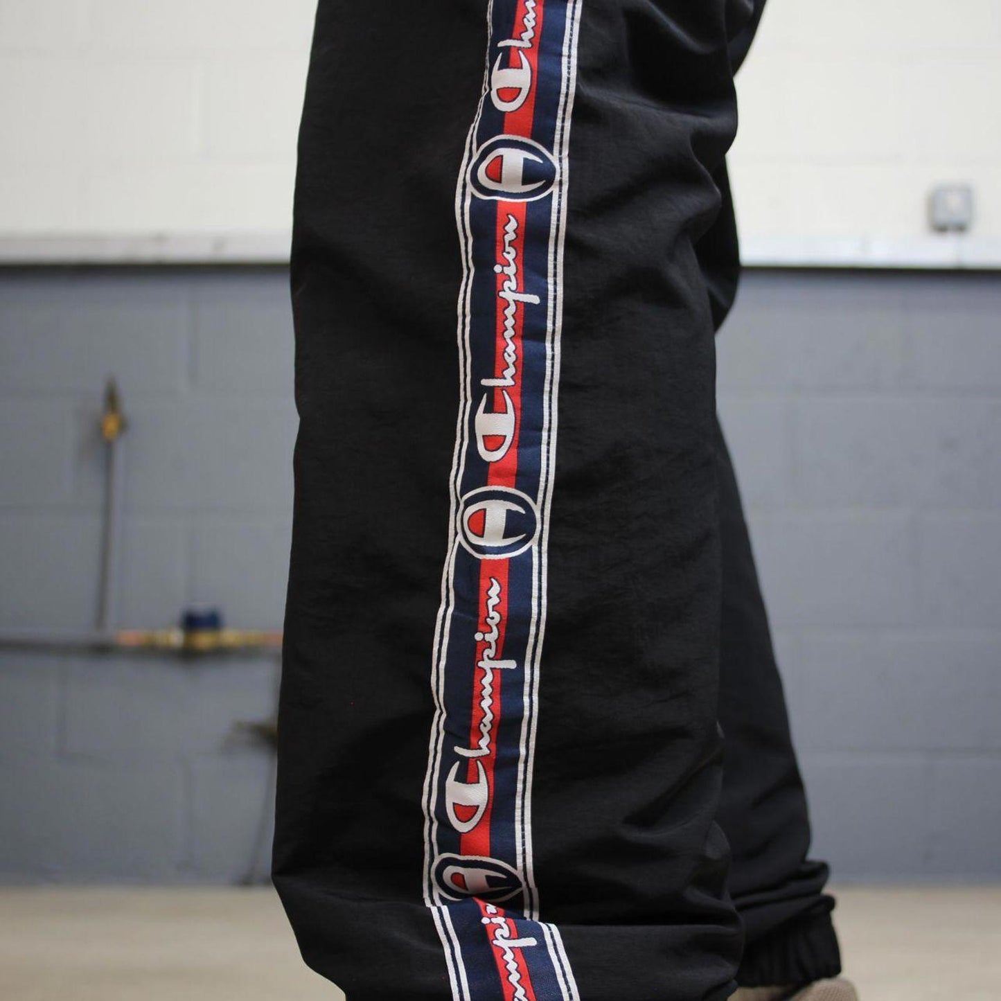 Vintage Champion tracksuit bottoms y2k style black joggers embroidered side stripe track pants